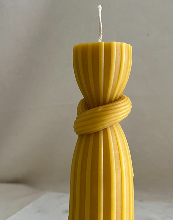 Medium-Sized Beeswax Knot Ribbed Table Candle - Image 3