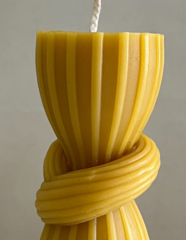Medium-Sized Beeswax Knot Ribbed Table Candle - Image 4