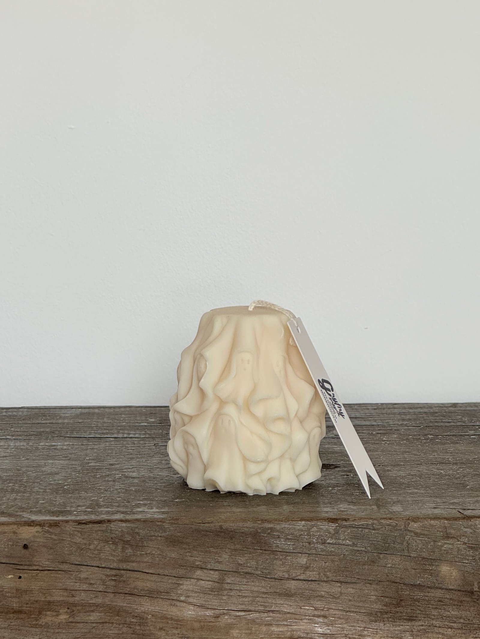 The SPOOKY CURTAINS candle